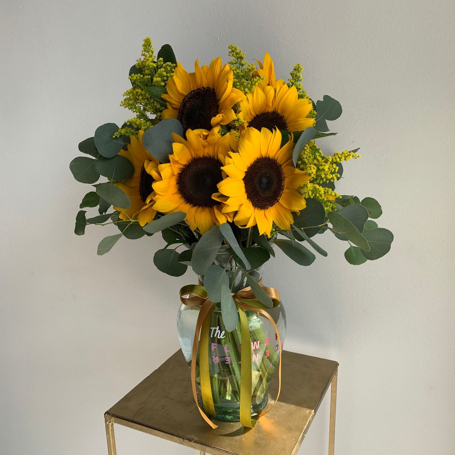 Florero de girasoles