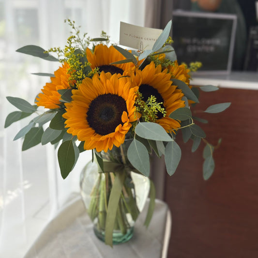 Florero de girasoles